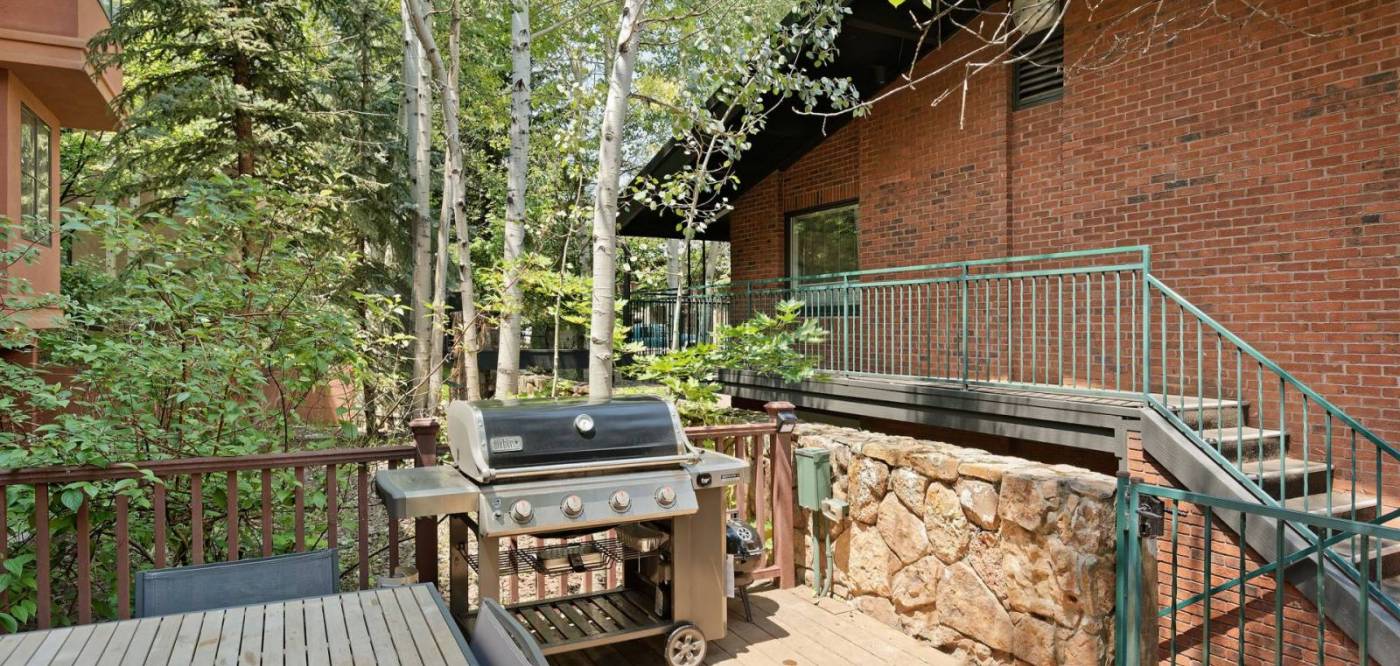 Aspen Mountain Condos has a great outdoor space with shared hot tub and gas grill.